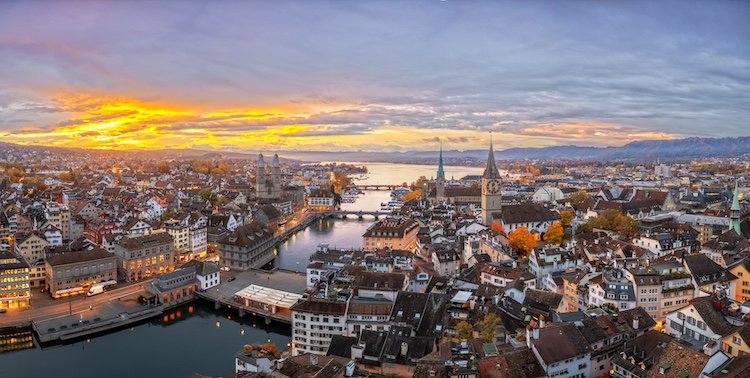 Zurich, Switzerland old town skyline over the Limmat River on an autumn morning.
